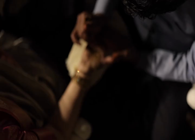 A Slow Motion Shot of Applying Mehndi on Bride's hand at her Indian Wedding in India