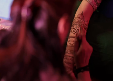 A Slow Motion Shot of Applying Mehndi on Bride's hand at her Indian Wedding in India