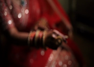 A Shot of an Indian Bride showing her Bridal Jewellery at her Indian Wedding in India