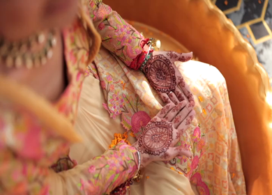 A Shot of Indian Bride showing Mehndi in her Hands at her Indian Wedding in New Delhi, India