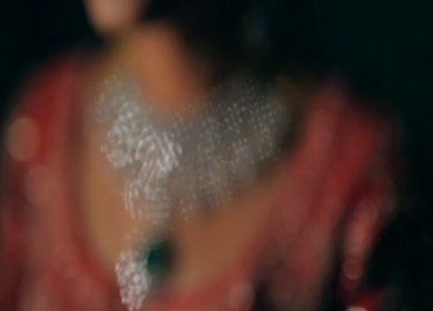 A Shot of an Indian Bride showing her Bridal Jewellery at her Indian Wedding in India