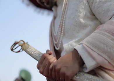 A shot of an Indian Groom posing for the photoshoot at his Indian Wedding