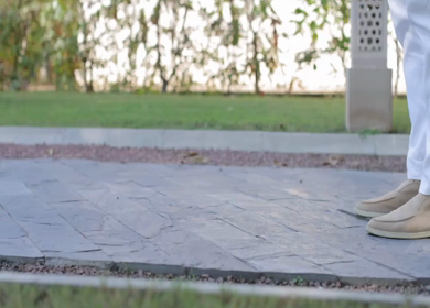 A shot of an Indian Groom posing for the photoshoot at his Indian Wedding
