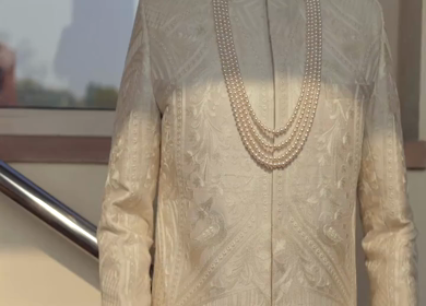 A shot of an Indian Groom posing for the photoshoot at his Indian Wedding