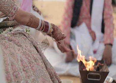 A Slow Motion Shot of an Indian Wedding where rituals are being performed in India